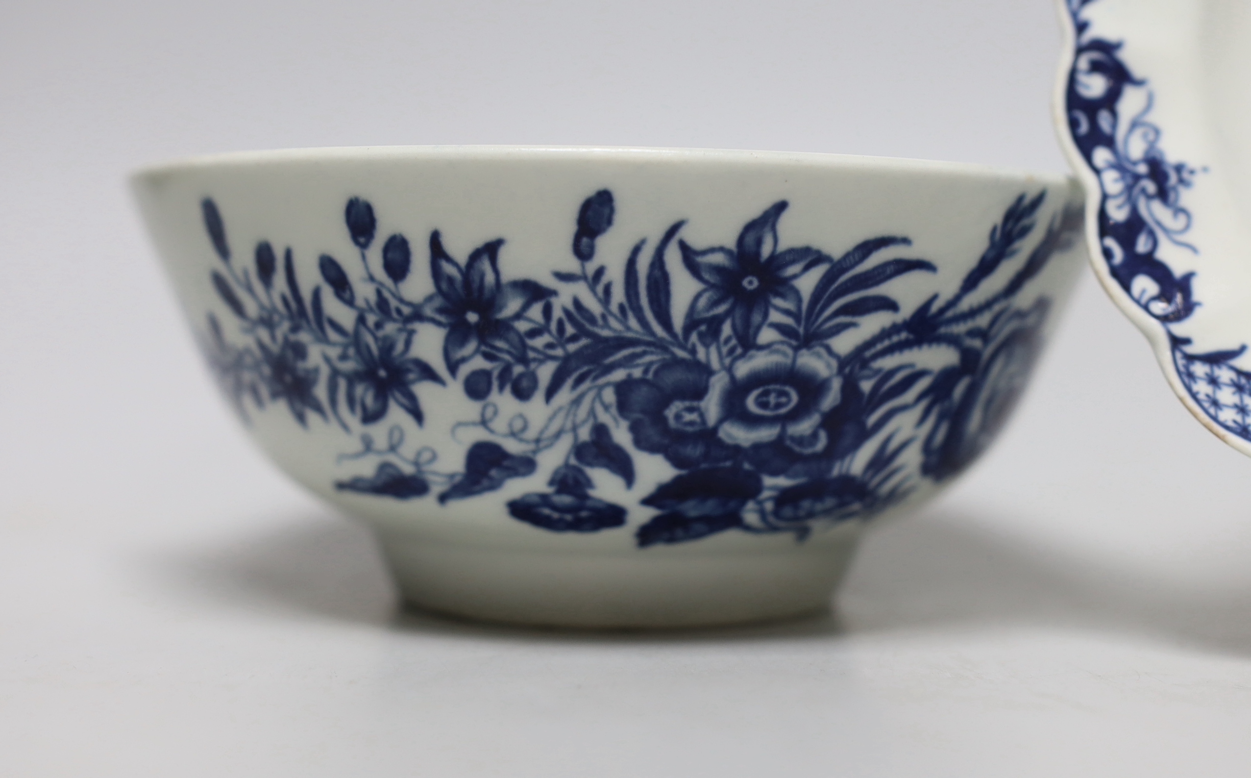 A Worcester Three Flowers pattern bowl and a Pine Cone pattern plate